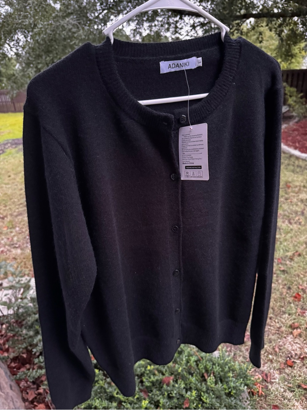 Women’s Black Button-Front Cardigan size L, PTP 23“, overall length 24“